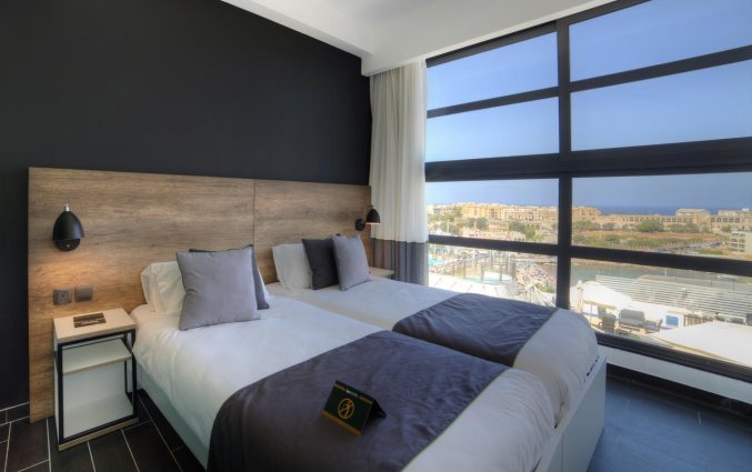 Slaapkamer van Be.Hotel in Malta